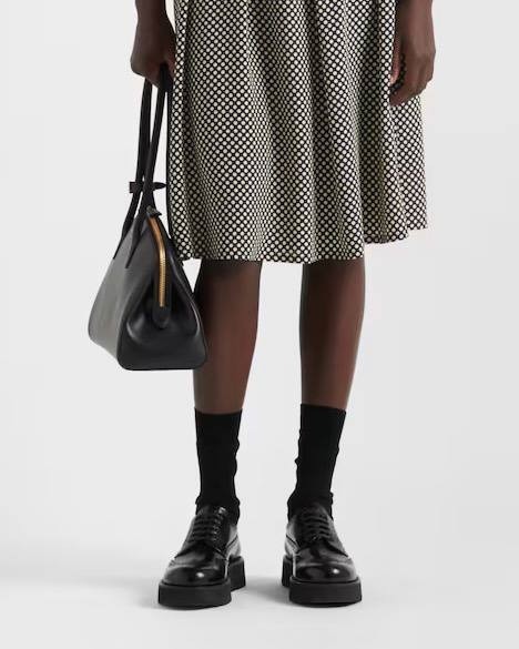 Лоуферы Prada